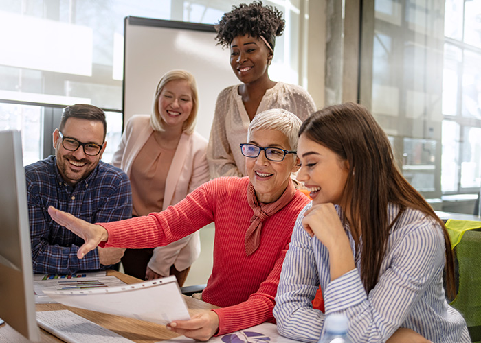 couple of people working together